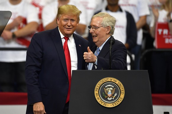 FILE - Then President Donald Trump, left, and Senate Majority Leader Mitch McConnell of Ky., greet each other during a campaign rally in Lexington, Ky., Nov. 4, 2019. McConnell has endorsed Donald Tru ...