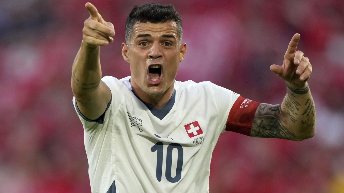 Switzerland's Granit Xhaka reacts during a Group A match between Scotland and Switzerland at the Euro 2024 soccer tournament in Cologne, Germany, Wednesday, June 19, 2024. (AP Photo/Martin Meissn ...
