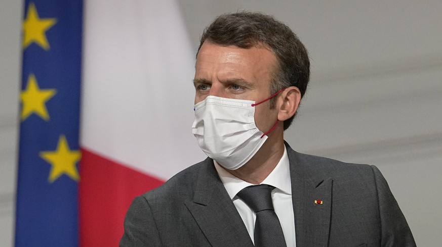 France&#039;s President Emmanuel Macron, meets French carmakers at the Elysee Palace in Paris, Monday, July 12, 2021. President Emmanuel Macron is hosting a top-level virus security meeting Monday mor ...