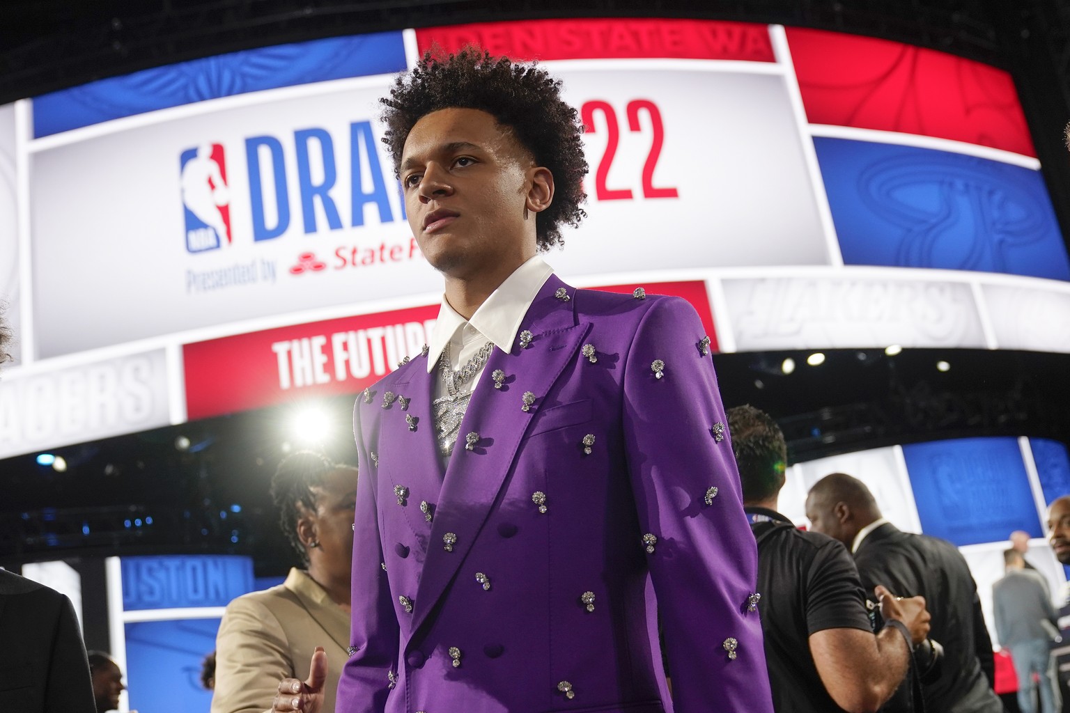 Paolo Banchero walks the floor before the start of the the NBA basketball draft, Thursday, June 23, 2022, in New York. Banchero was selected first overall by the Orlando Magic. (AP Photo/John Minchill ...