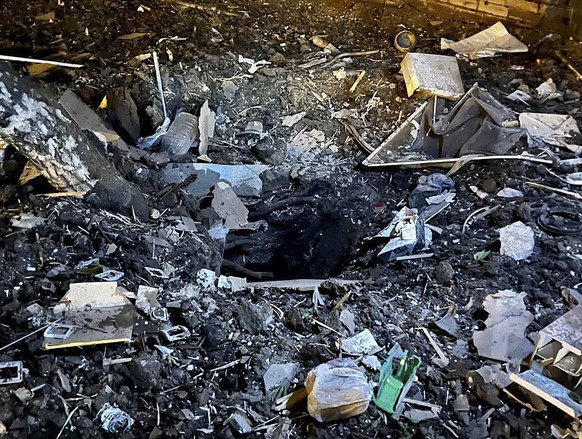 epa10583549 A handout photo made available by the Governor of the Belgorod Region Vyacheslav Gladkov���s telegram channel shows damage at the site of a blast in downtown Belgorod, Russia, 20 April 202 ...