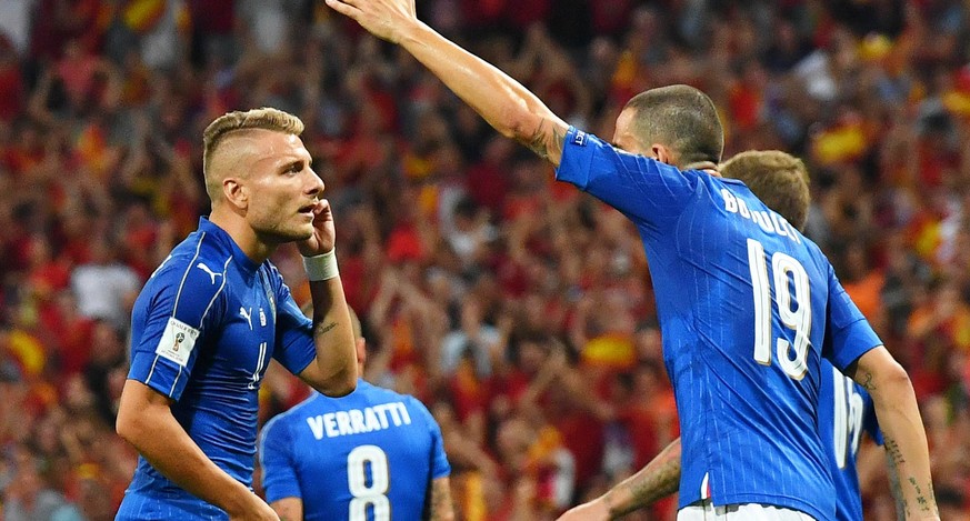 epa06180065 Italian players Ciro Immobile (L) and Leonardo Bonucci (R) react during the FIFA World Cup 2018 qualifying soccer match between Spain and Italy at the Santiago Bernabeu stadium in Madrid,  ...