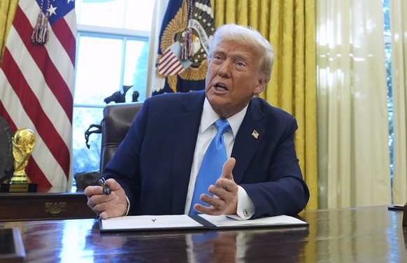 FILE - President Donald Trump speaks to reporters as he signs executive orders in the White House, Feb. 4, 2025, in Washington. (AP Photo/Evan Vucci, File)
Donald Trump