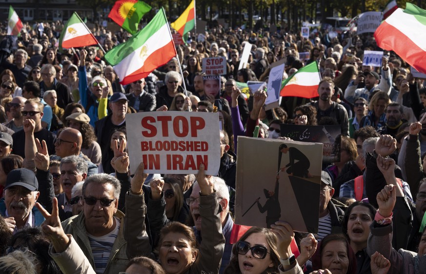 FILE - Thousands showed their support for Iranian protesters standing up to their leadership over the death of a young woman in police custody, during a demonstration in The Hague, Netherlands, Saturd ...