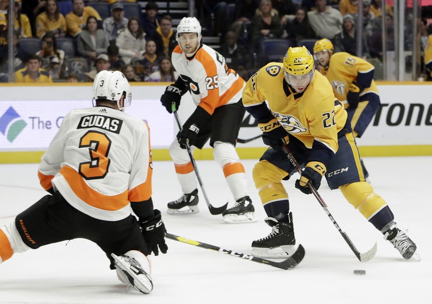 Philadelphia Flyers defenseman Radko Gudas (3), of the Czech Republic, tries to block a shot by Nashville Predators left wing Kevin Fiala (22), of Switzerland, during the second period of an NHL hocke ...