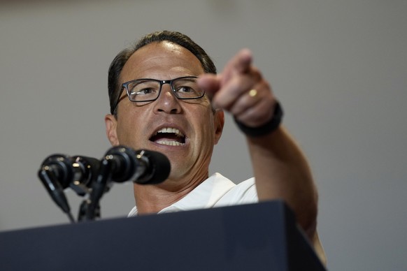 Pennsylvania Gov. Josh Shapiro speaks before Democratic presidential nominee Vice President Kamala Harris and President Joe Biden at a campaign event at the IBEW Local Union #5 union hall in Pittsburg ...