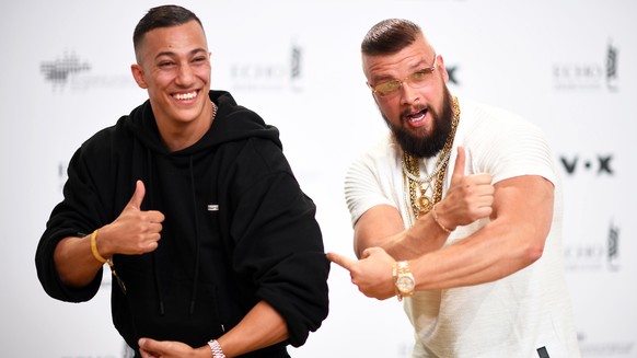 epa06691718 (FILE) - German musicians Kollegah (R) and Farid Bang (L) pose on the red carpet as they attend the 27th Echo 2018 music awards in Berlin, Germany, 12 April 2018. According to media report ...