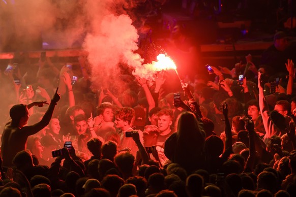 A festival goer pictured with a pyro during the concert of US rapper A$AP Rocky aka Rakim Mayers on the Main Stage during the 20th edition of Royal Arena Festival, Sunday, August 18, 2019 in Biel, Swi ...