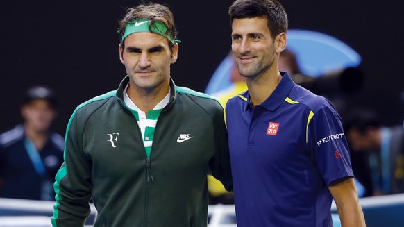 Roger Federer, left, of Switzerland and Novak Djokovic, right, of Serbia pose for a photo ahead of their semifinal match at the Australian Open tennis championships in Melbourne, Australia, Thursday,  ...