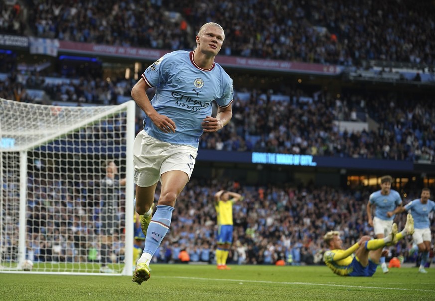 Manchester City's Erling Haaland celebrates after scoring his side's opening goal during the English Premier League soccer match between Manchester City and Nottingham Forest at Etihad Stadium in Manc ...