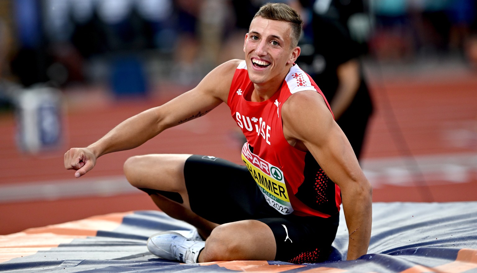 epa10122907 Simon Ehammer of Switzerland celebrates after an attempt in the High Jump of the Decathlon during the Athletics events at the European Championships Munich 2022, Munich, Germany, 15 August ...