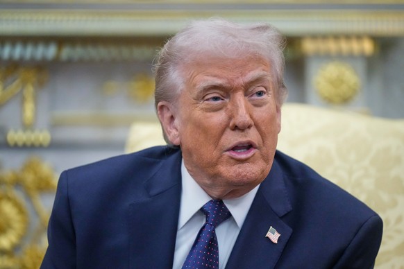 FILE - President Donald Trump speaks during a meeting with German Chancellor Friedrich Merz in the Oval Office at the White House, Tuesday, March 3, 2026, in Washington. (AP Photo/Mark Schiefelbein, F ...
