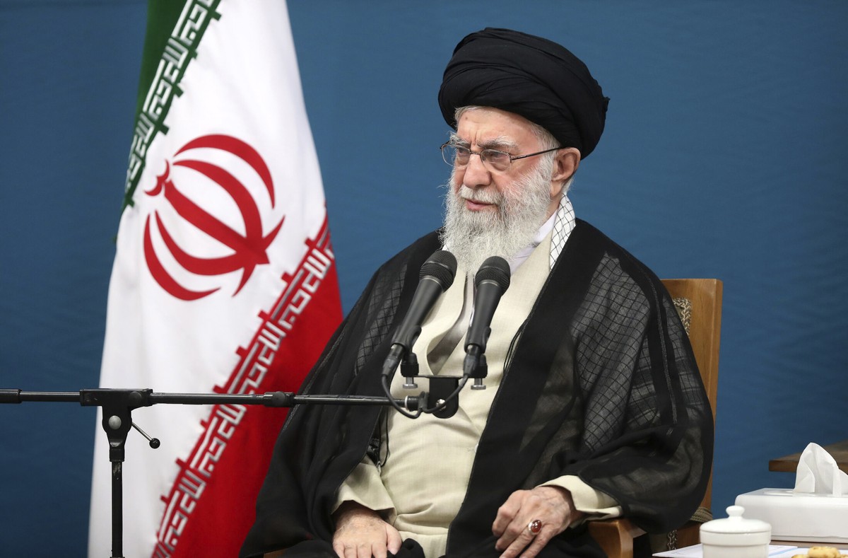 In this photo released by the official website of the office of the Iranian supreme leader, Supreme Leader Ayatollah Ali Khamenei attends a meeting with the President Masoud Pezeshkian's administ ...