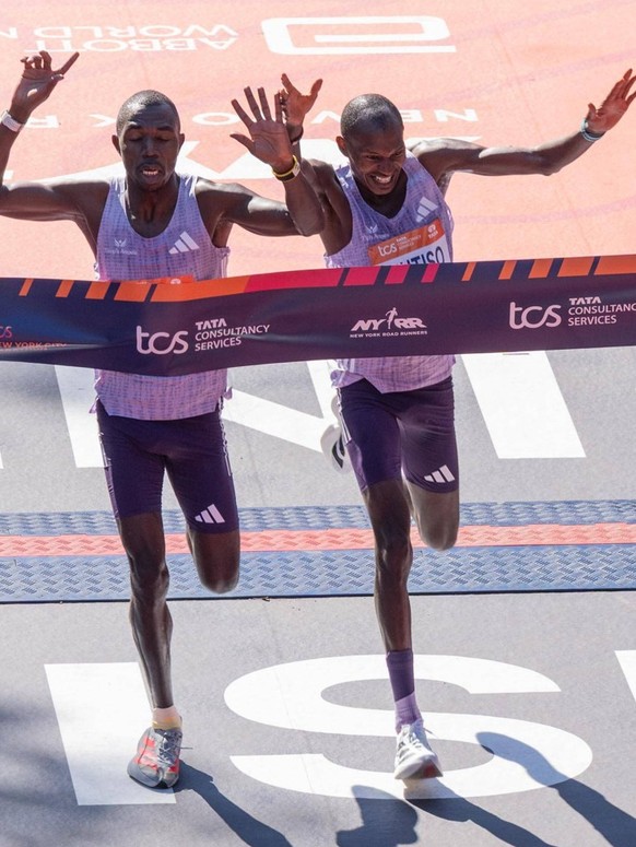 November 2, 2025, Bronx, New York, USA: Benson Kipruto pf Kenya winner of 1st place with time 2:08:09 and Alexander Mutiso of Kenya winner of 2nd place with time 2:08:09 just behind by .03 second cros ...