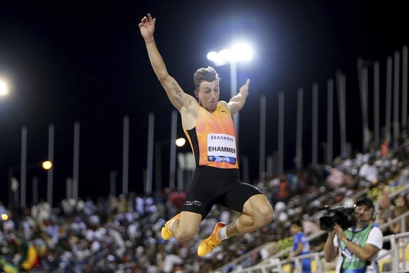 Simon Ehammer, of Switzerland, makes an attempt in the men&#039;s long jump during the Diamond League athletics meet at the Qatar Sports Club stadium in Doha, Friday, May 10, 2024. (AP Photo/Hussein S ...