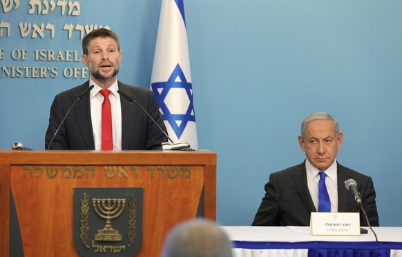 epa10400404 Israel&#039;s Prime Minister Benjamin Netanyahu (R) and Finance Minister Bezalel Smotrich (L) hold a press conference at the prime minister&#039;s office in Jerusalem, Israel, 11 January 2 ...