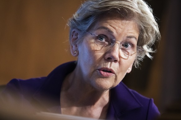 epa09799700 Sen. Elizabeth Warren, D-Mass., questions Federal Reserve Chairman Jerome Powell during the Senate Banking Committee hearing titled &#039;The Semiannual Monetary Policy Report to the Congr ...