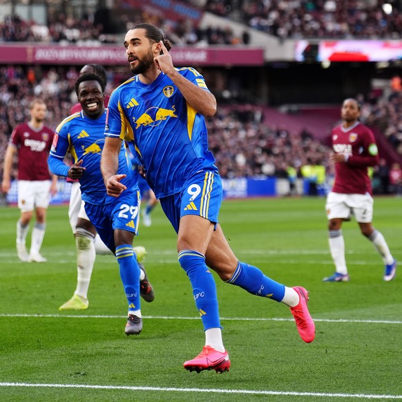 Leeds United's Dominic Calvert-Lewin celebrates scoring their side's second goal from a penalty during the English FA Cup quarterfinal soccer match between West Ham United and Leeds United i ...