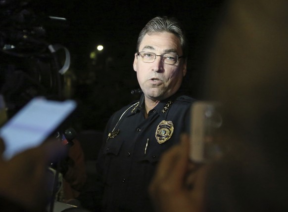Tallahassee police chief Michael DeLeo speaks to the press at the scene of a shooting, Friday, Nov. 2, 2018, in Tallahassee, Fla. A shooter killed one person and critically wounded four others at a yo ...