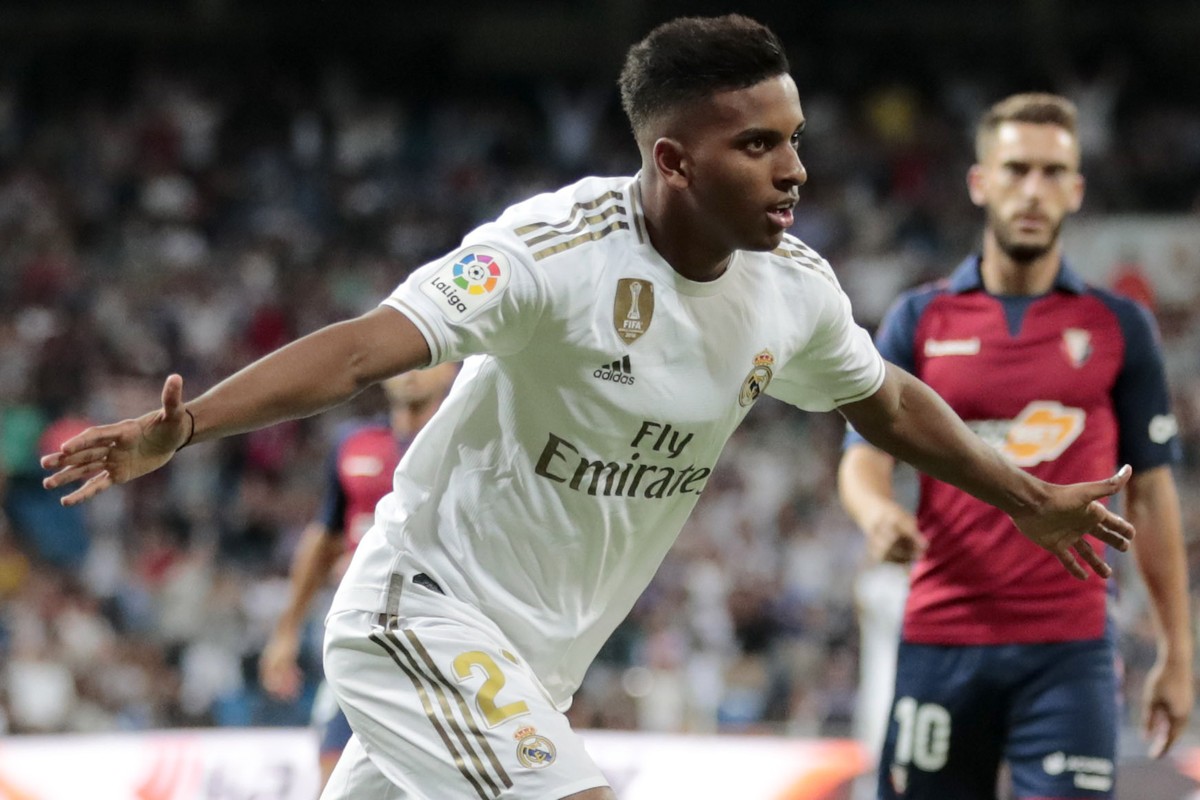 Real Madrid's Rodrygo celebrates scoring his side's 2nd goal, during the Spanish La Liga soccer match between Real Madrid and Osasuna at the Santiago Bernabeu stadium in Madrid, Spain, Wedne ...