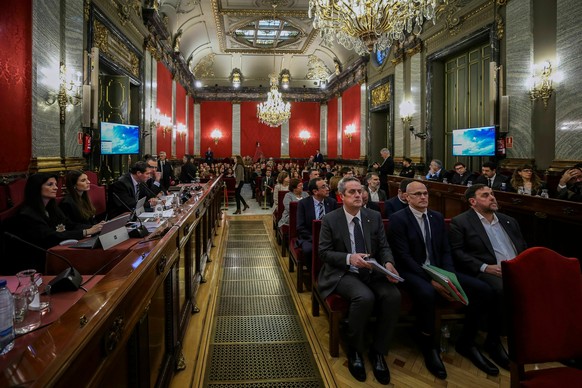 Front row from left, Joaquim Form, Raul Romeva, Oriol Junquera, second row from left, Josep Rull, Jordi Turull, Jordi Sanchez, third row from left, Dolors Bassa, Carmen Forcadell, Jordi Cuixart, back  ...