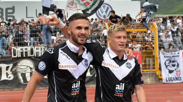 Lugano&#039;s player Ezgian Alioski, right, and Lugano&#039;s player Armando Sadiku, right, celebrate 2-2 goal during the Super League soccer match FC Lugano against FC Basel, at the Cornaredo stadium ...