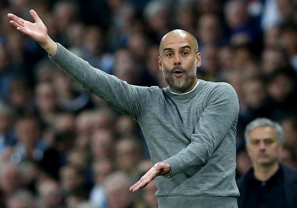 epaselect epa06653114 Manchester City&#039;s manager Pep Guardiola (L) and Manchester United&#039;s manager Jose Mourinho (R) during the English Premier League soccer match between Manchester City and ...