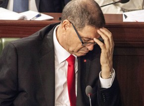 epa05448975 Prime Minister of Tunisia Habib Essid reacts during parliamentary session before the vote of confidence in Tunis, Tunisia, 30 July 2016. Essid is facing a vote of confidence after a year a ...