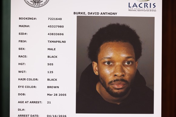 epa12903156 A mugshot picture of singer David Anthony Burke (D4vd) is presented at a press conference held by Los Angeles District Attorney and LAPD law enforcement officials, as charges were filed ag ...