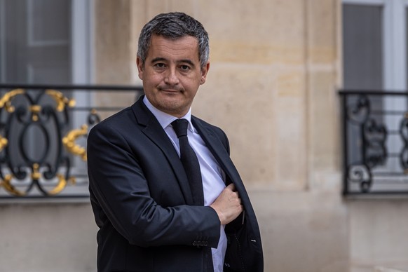 epa10925364 French Interior Minister Gerald Darmanin leaves the Elysee Palace after the weekly cabinet meeting in Paris, France, 18 October 2023. EPA/CHRISTOPHE PETIT TESSON