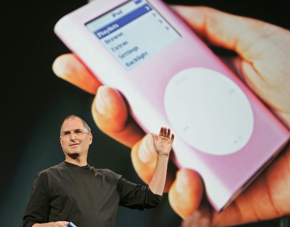 FILE - In this Aug. 4, 2005 file photo, Apple CEO Steve Jobs speaks during a launch event for Apple's music download service, iTunes, in Tokyo. A billion-dollar class-action lawsuit over Apple’s iPod  ...
