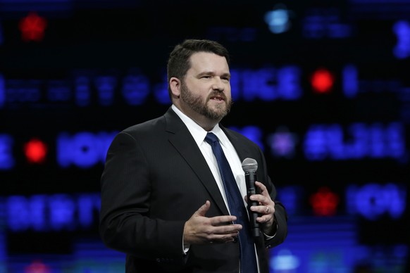 FILE - In this Nov. 1, 2019, file photo, Iowa Democratic Party Chair Troy Price speaks during the Iowa Democratic Party&#039;s Liberty and Justice Celebration in Des Moines, Iowa. Two of the first thr ...