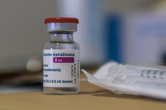 epa09038094 A vial containing 10 doses of the Oxford Astra-Zeneca COVID-19 vaccine in Paris, France, 26 February, 2021. France begins vaccination of people aged 50 to 64 with Astrazeneca anti-covid19  ...