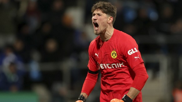 epa10455633 Dortmund&#039;s goalkeeper Gregor Kobel celebrates after his team scores the 1-0 lead during the German DFB Cup Round of 16 soccer match between VfL Bochum and Borussia Dortmund in Bochum, ...