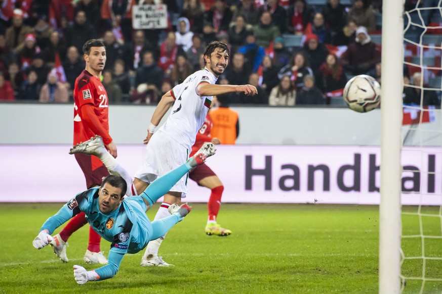 Bulgaria's goalkeeper Ivan Karadzhov watches the ball shot by Switzerland's forward Noah Okafor end up on the goalpost during the 2022 FIFA World Cup European Qualifying Group C match betwee ...