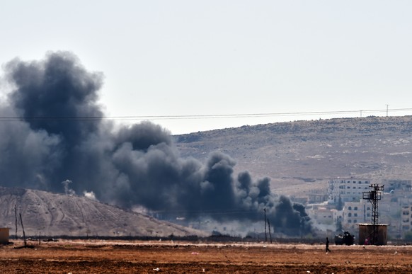Rauch steigt auf aus der belagerten Stadt Kobane (arabisch: Ain al-arab).