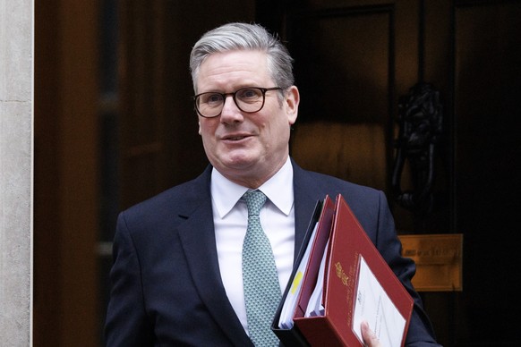 epa11812952 British Prime Minister Keir Starmer departs his official residence at 10 Downing Street to appear at Prime Minister&#039;s Questions (PMQs) at Parliament in London, Britain, 08 January 202 ...