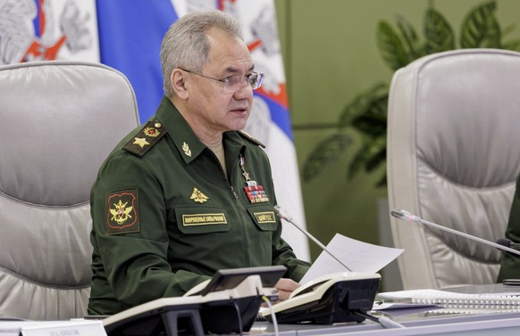 epa10604250 A handout photo provided by the press service of the Russian Ministry of Defense of Sergei Shoigu, the Russian Defense Minister, giving a speech on a conference call with…