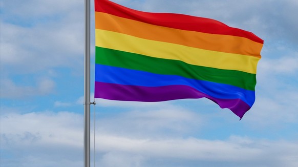 Iraq and LGBT movement flags waving together on blue cloudy sky Model Released Property Released xkwx LGBT gay pride transgender gay pride lesbian bisexual homosexual homosexuality flag sky flapping w ...