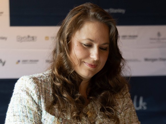 250916 -- BUDAPEST, Sept. 16, 2025 -- Judit Polgar, chess grandmaster, plays a game of RubikChess at the press conference of the Global Chess Festival in Budapest, Hungary on Sept. 16, 2025. To go wit ...