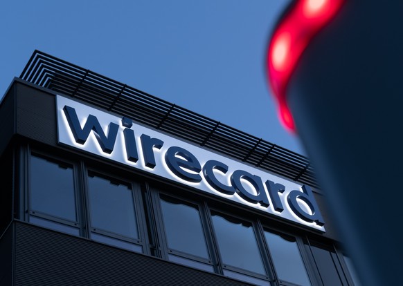 ARCHIV - 20.07.2020, Bayern, Aschheim: Das Wirecard-Logo ist am Hauptsitz des Zahlungsdienstleisters zu sehen. Das Streamingportal TVnow will ab Ende M