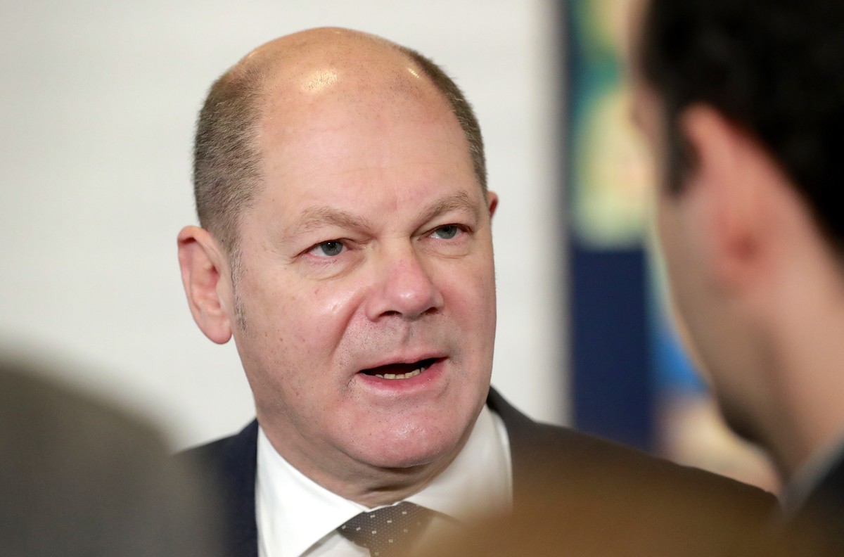 epa07486129 Germany's Vice Chancellor and Federal Minister of Finance, Olaf Scholz makes a media statement as he arrives for the Informal reunion of the EU Finance ministers from the Euro Area (E ...