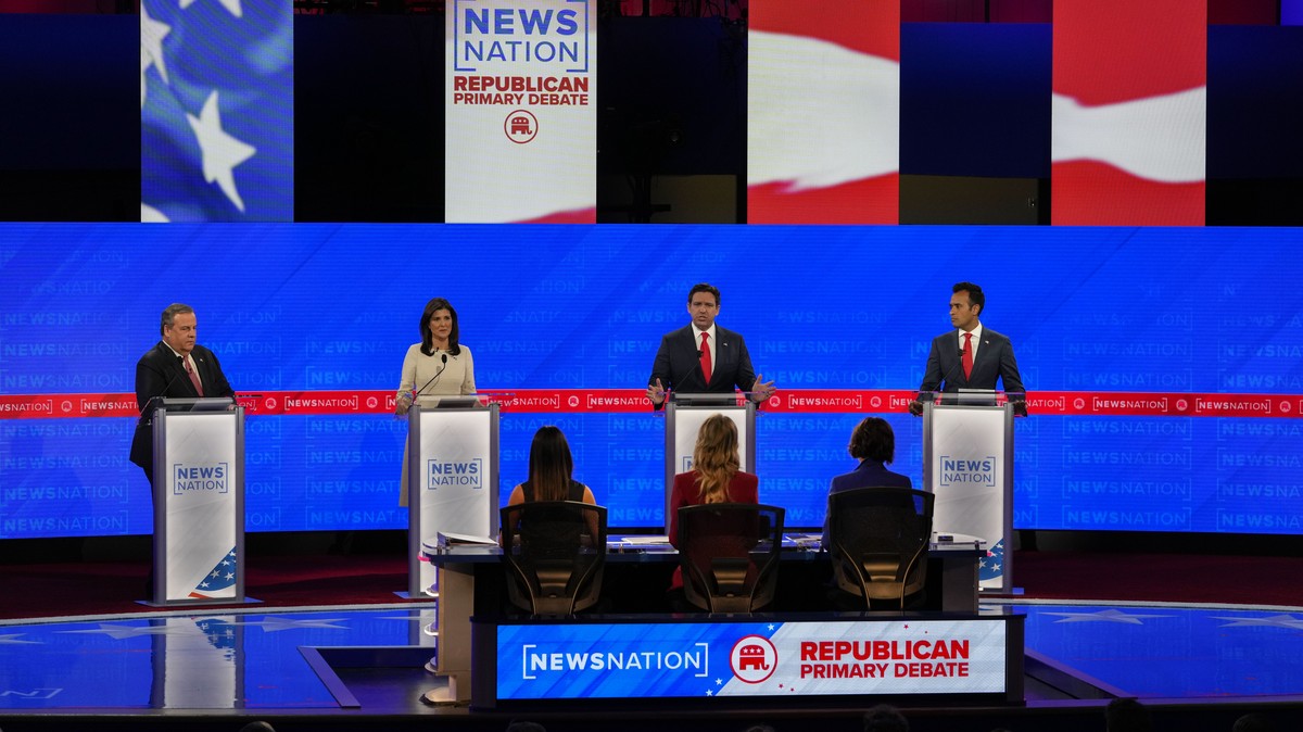 Republican presidential candidate Florida Gov. Ron DeSantis, third from left, speaks as former New Jersey Gov. Chris Christie, left, former U.N. Ambassador Nikki Haley and businessman Vivek Ramaswamy, ...