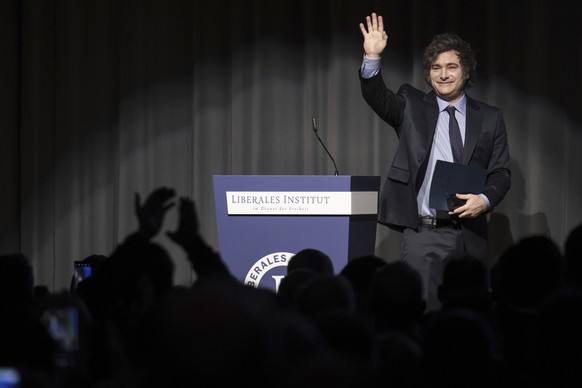 Argentina&#039;s President Javier Milei waves after receiving this year&#039;s Roepke Prize for Civil Society of the Liberal Institute at the Congress centre in Kloten, Switzerland, Friday, Jan. 24, 2 ...