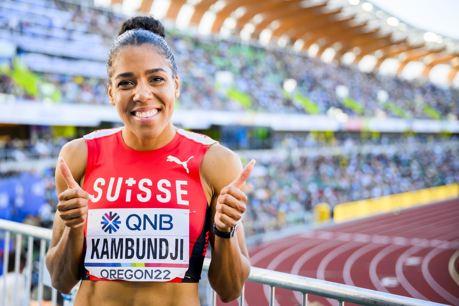 Mujinga Kambundji of Switzerland reacts for the women&#039;s 200 meters semi-final during the IAAF World Athletics Championships, at the Hayward Field stadium, in Eugene, United States, Tuesday, July  ...