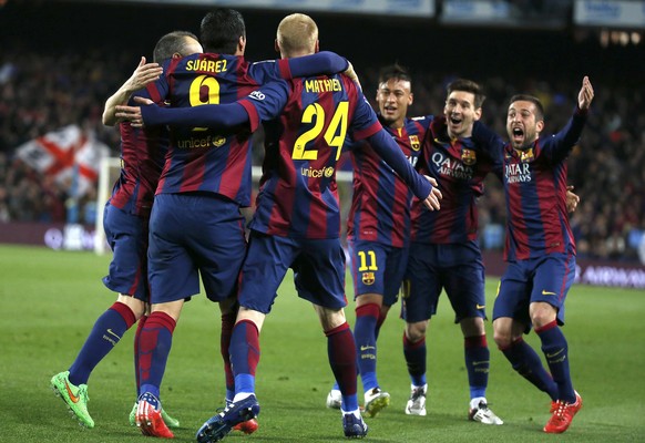Barcelona&#039;s (L to R) Andres Iniesta , Luis Suarez , Jeremy Mathieu , Neymar, Lionel Messi and Jordi Alba celebrate Mathieu&#039;s goal against Real Madrid during their Spanish first division &quo ...