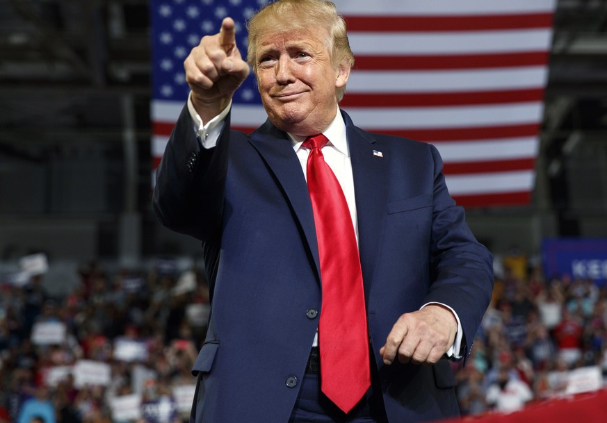 FILE - In this Wednesday, July 17, 2019 file photo, President Donald Trump gestures to the crowd as he arrives to speak at a campaign rally at Williams Arena in Greenville, N.C. Former President Donal ...