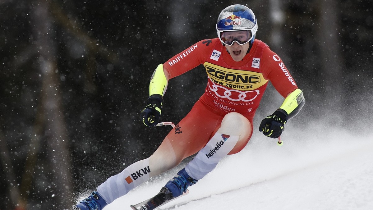 Switzerland's Marco Odermatt speeds down the course during an alpine ski, men's World Cup Super-G in Val Gardena, Italy, Friday, Dec. 20, 2024. (AP Photo/Gabriele Facciotti)