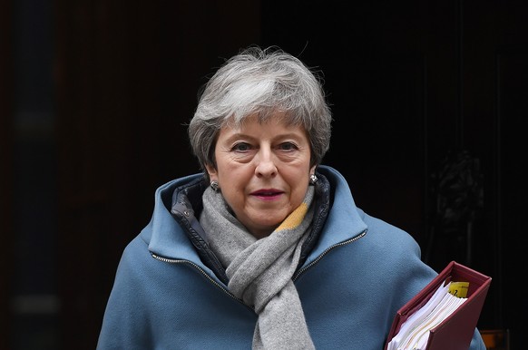 epa07450198 British Prime Minister Theresa May departs Downing Street for the Prime Minister questions at the parliament in London, Britain, 20 March 2019. British Prime Minister Theresa May is set to ...