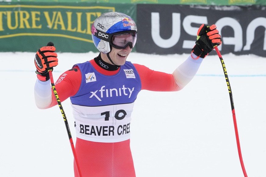 Switzerland's Marco Odermatt reacts after finishing his run during a men's World Cup downhill skiing race Saturday, Dec. 3, 2022, in Beaver Creek, Colo. (AP Photo/Robert F. Bukaty)